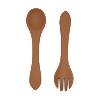 China Safe Toddler Self Feeding Utensil BPA Free Set Of 2 Dishwasher Safe BPA Free Soft Silicone Spoon And Fork For Baby for sale