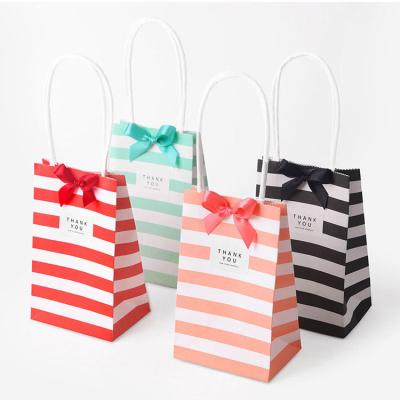 China Small Biodegradable Gift Bag With Handles Bow Ribbon Stripe Paper Handbag Cookies Candy Festival Wedding Party Gift Packaging Bags for sale