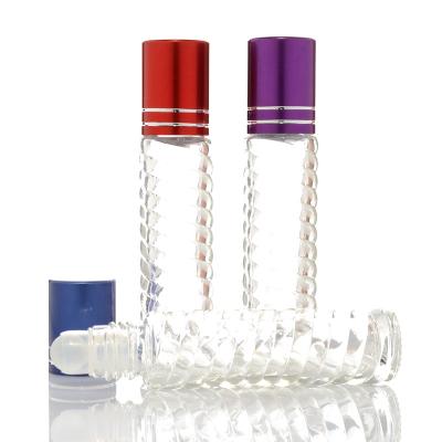 China 10ml clear frosted glass roll on bottle with metal roller ball roll on perfume bottle à venda