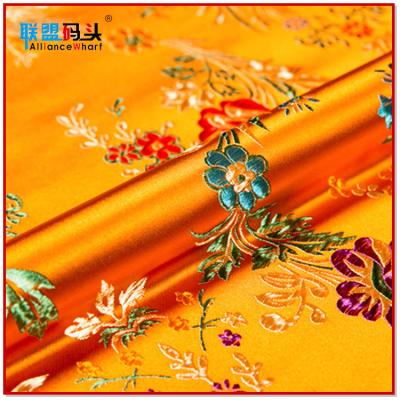 China 2020 Viable High Quality In Red Jacquard Chinese Running Style Crabapple Flower Brocade Fabric For Home Textiles for sale