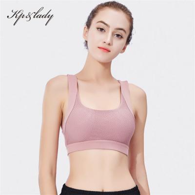 China Wholesale Breathable Sexy Hot Strappy Sexy Sports Yoga Women Workout Custom Sports Seamless Bra for sale