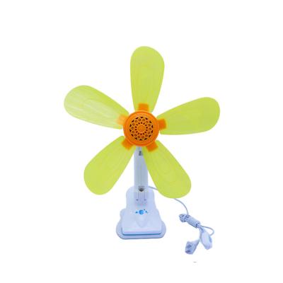 China Small Beautiful Plastic Home Office Cooler Five-blades Table Clip Fan Appliances Fashional Electric Rotary Radiator Fan for sale