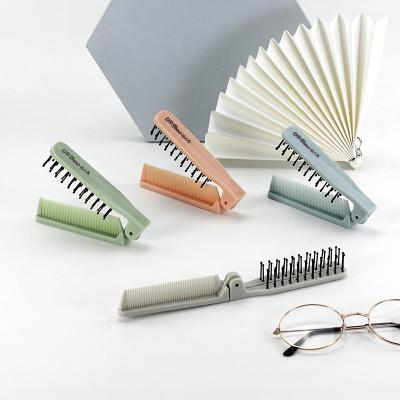 China Travel Comfortable Oval Portable Mini Folding Wide Tooth Anti-Static Foldable Comb for sale