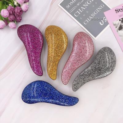 China Magic Palette Glitter Instant Handle Tangled Hair Brush TTT Comb Extension Hair Brush Detangling Hair Combs for sale