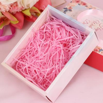 China Shredded Shredded Paper Filler Colorful 100g/bag Recyclable 2-4MM Width Raffia Gift Box Filler Paper Shred Paper for sale