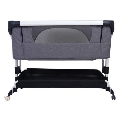 China Adjustable Height Adjustment Bedside Baby Crib Newborn Swinging Hutch for Baby Sleeping for sale