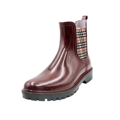 China Waterproof Wholesales Women's Handmade Warm Plaid PCV Upper Outdoor Boots for sale