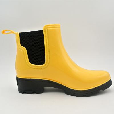 China Lady PVC Waterproof Ankle Yellow Rain Boots Fashion Shoes ODM/OEM With Design Boot for sale