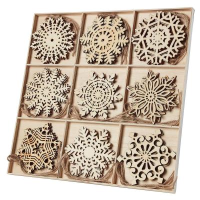 China Handmade Wholesale Hanging Wooden Snowflake Christmas Tree Ornaments for sale