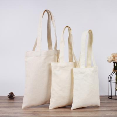 China Best Simple White Tote Bag Eco-Friendly Large White Cotton Tote Bag Canvas Tote Bag Cotton Tote Bag for sale