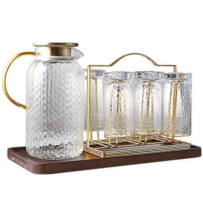 China Casual Unique Design Hot Sale Ceramic Teapot Kettle Set Glass Hammer Water Cup Set for sale