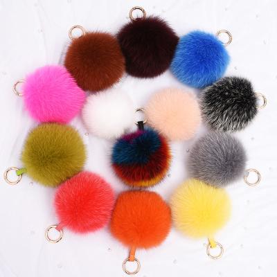 China Various fashion colors of fur pom raccoon fox fur ball head chain hats wholesale for sale