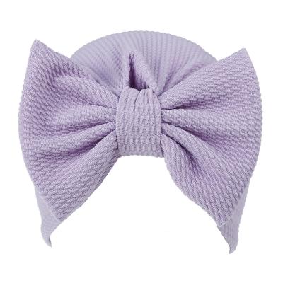 China Big Logo Bowknot Baby Hats Thick Cute Embroidered Beanie Toddler Winter Infant Elastic Custom Made Breathable Solid Color for sale