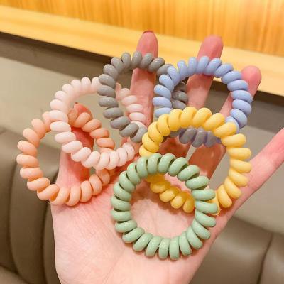 China Curly Hair Women Shapes Macaron Color Telephone Wiring Hair Band Hair Loves Elastic Hair Ties For Women for sale