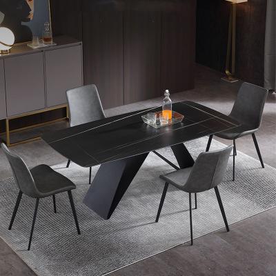 China Easy Compile Carbon Steel Modern Nordic Minimalist X Shaped Leg Marble Slab Household Rectangular Rock Dining Table for sale