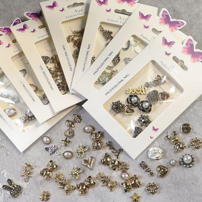 China Wholesale Mix Alloy Nail Charm Bear Butterfly Pentagram Metal Alloy Nail Decoration Crystal Nail Jewelry 2022 Shiny for sale