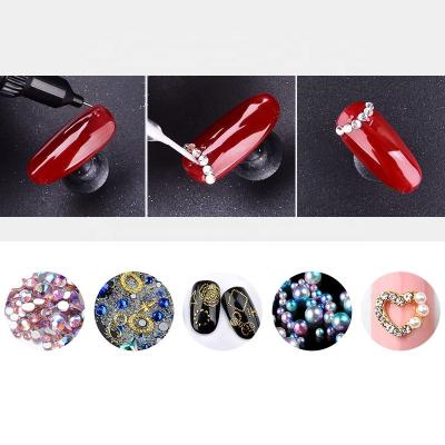 China New Arrival 10ml GE Rhinestone Multifunctional Sticky Adhesive UV Glue Multifunction Glue Nail Phototherapy Gel Nail Tools for sale