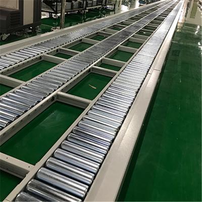 China Heat Resistant Electric Powered Steel Roller Conveyor Machine With Fence for sale