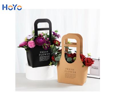 China Recyclable Recyclable Kraft Paper Carry Bag With Your Own Logo Paper Bag For Fresh Flower With Handle nc styles for sale