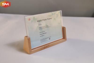 China New Style Clear Acrylic Sign Holder Photo Frame OEM With Wood Base Stand Diaplay for sale