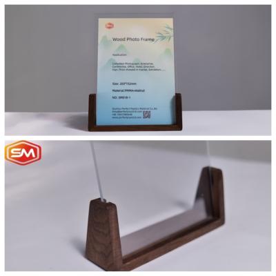 China Embedded Acrylic Photo Frame Tableholoder Wood Base for sale