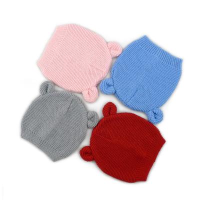 China 2020 winter baby beanie jacquard pom pom pom hat striped acrylic knitted high quality custom for sale