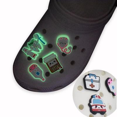 China Clog Charm Stock PVC Rubber Led Flashing Shoe Charms Accessories Loops Luminous Light Up Medical Shoe Charm for sale