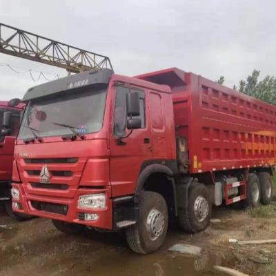 China Used SINOTRUK HOWO Dump Truck 8x4 30tons Used Truck Left Hand Drive Tipper Truck > 8L for sale