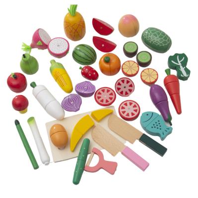 China Children play hot selling new style role playing simulation wooden toy kitchen magnetic fruits and vegetables cutting toys for sale