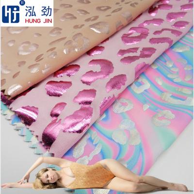 China Two way anti pill knit pink leopard print on weft knitted fabric polyester spandex fabric nylon pink polyester fabric for sale