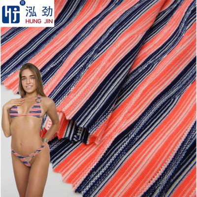 China Anti Pill New Arrival 82 nylon 18 spandex fabric bikini fabric print microfiber spandex swimwear gym wear set for women for sale