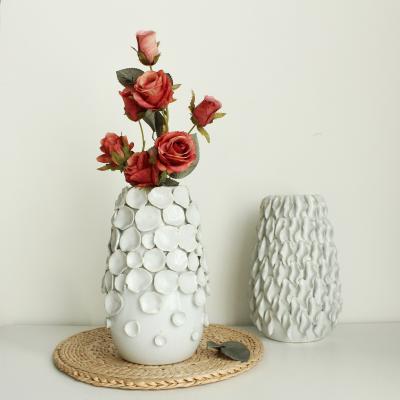 China Minimalist European Luxury Style White Ceramic Vase Textured Living Room Unique Minimal Nordic Modern Creative Hotel Shape Home Decoration for sale