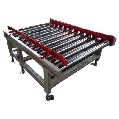 China Delivery of finished products in logistics roller conveyor for packaging and printing for sale