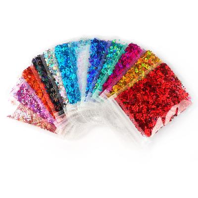 China Eco-friendly Colorful English Laser Letter Slice Decorations 12 Grid Nail Glitter Sequin Art Nail Glitter for sale