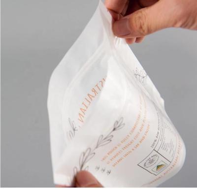 China Compostable Corn Starch Laminated Biodegradable Packaging Bag PLA Bag PBAT Corn Starch Compostable Pouch With Lip for sale