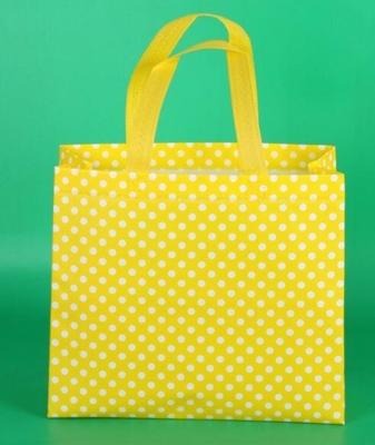 China el bolso no tejido más nuevo para hacer compras con fashional, bolso no tejido laminado metálico de encargo promocional, tela Reus del estilo en venta