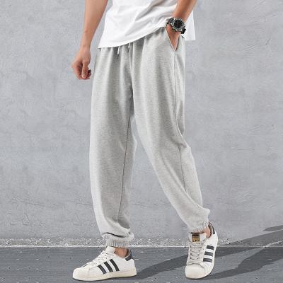 China Anti-Wrinkle Custom Design Men Pants Loose Pants Men Wholesale Vacuum Jogger Pants For Men for sale