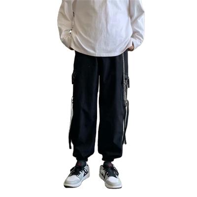 China Anti-Wrinkle Hip Hop Cargo Pant Custom Prints Iron Ornament Street Wear Chain Pants For Men Black for sale