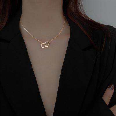 China TRENDY Necklace Women Wholesale Fashion Love Stainless Steel Cavity Heart Pendant 18K Gold Double Clavicle Chain Jewelry for sale