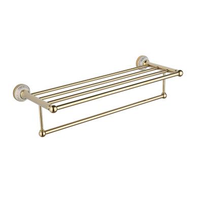 China Zinc Alloy Fashion Gold Bathroom Towel Accessory Shelf Wall Mounted Towel Shelf for sale