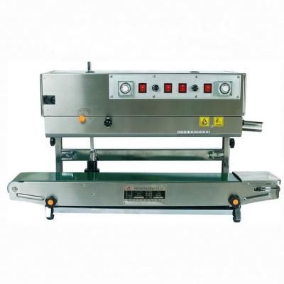 China FRM-980LW CLOTHING Type Vertical Aluminum Foil Sealing Machine for sale