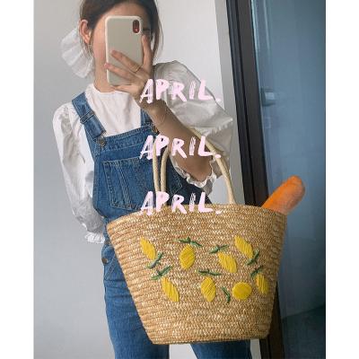 China Summer Para Mujeres Bolso Bolsas Bohemian Hand & Bucket Woven Drawstring Straw Shoulder Bag for sale