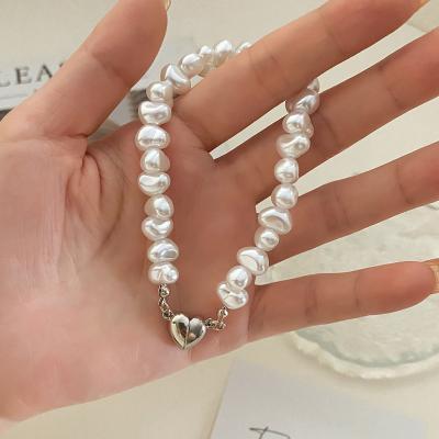 China FASHIONABLE Luxury LOVE Charm Magnet Gift Women Irregular Freshwater Pearl Bracelet KISSWIFE Pearl Bracelets for sale