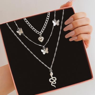 China FASHIONABLE Butterfly Chain Dish Ribbon KISSWIFE Jewelry Bohemian Charm 3 Layers Snake Pendant Necklace Choker for sale