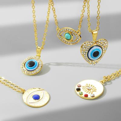 China Fashion KISSWIFE 18K Gold Turkish Tasty Crystal Diamond Heart Blue Evil Eyes Pendant Necklace For Women Jewelry for sale