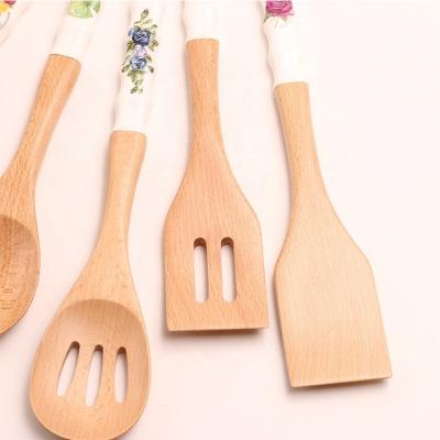 China Sustainable Bamboo Kitchen Utensil Set - 5 Piece Premium Cooking Tools & Implements; Spoons, and Spatulas with Hanging Blocking Holes in the Han for sale