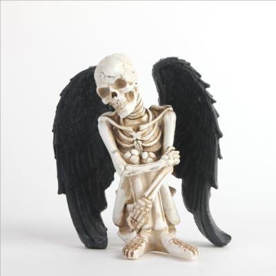 China Europe 3D Resin Skeleton Model Skull With Dark Wing Figurine For Halloween Decor for sale