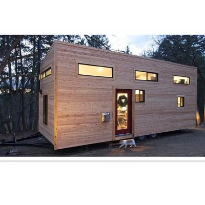 China Modern Tiny Mobile Flat Pack Wood Home Light Steel Frame Portable Modular Houses on Wheels for sale