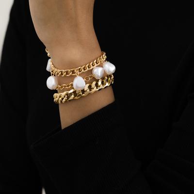 China FASHIONABLE punk style designer Charms Chain Jewelry imitation pearl bracelet for women for sale