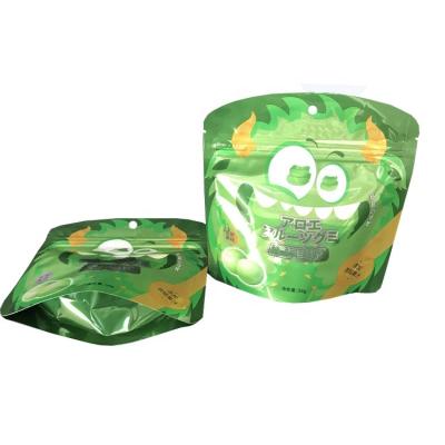 China 100g Security Custom Printed Bright Packaging Candy And Chocolate Zipper Bags With Stand for sale